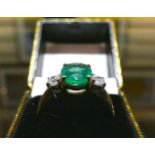 A 2.8 Carat oval Emerald and 0.40 Carat