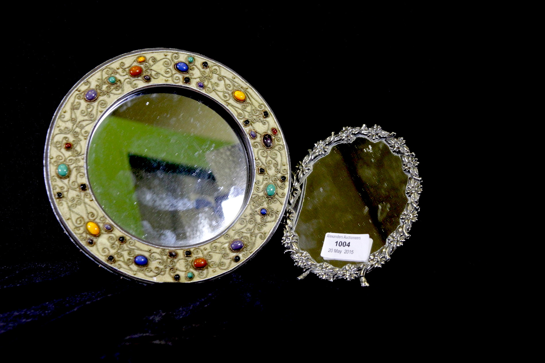A circular hand painted mirror with ceramic bead decoration plus another mirror with a decorative