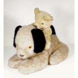 A jointed mohair Teddy bear with articulated limbs plus a pyjama case toy dog. Bear: H28cm. Dog: