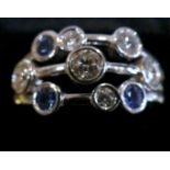 A contemporary Diamond and Sapphire ring