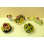 A collection of ceramic floral arrangements, to include a potpourri pomander, Royal Doulton, Radnor,