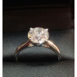 A 2 Carat round brilliant cut GSL1 colour G Diamond solitaire ring, in 18 Carat white Gold. Size M.