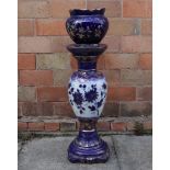 A ceramic jardiniere with pedestal. H86c