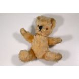 A mohair Teddy bear with articulated lim