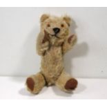 A mohair Teddy bear with articulated lim