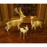 Three Beswick deer. (3)