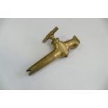 A late 19th century brass wine or beer spigot