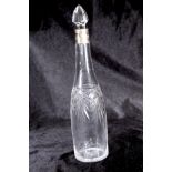 A lead crystal decanter with stopper and