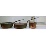 A 19th copper saucepan with a rivetted i