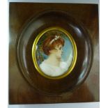 A 20thC head and shoulders portrait mini