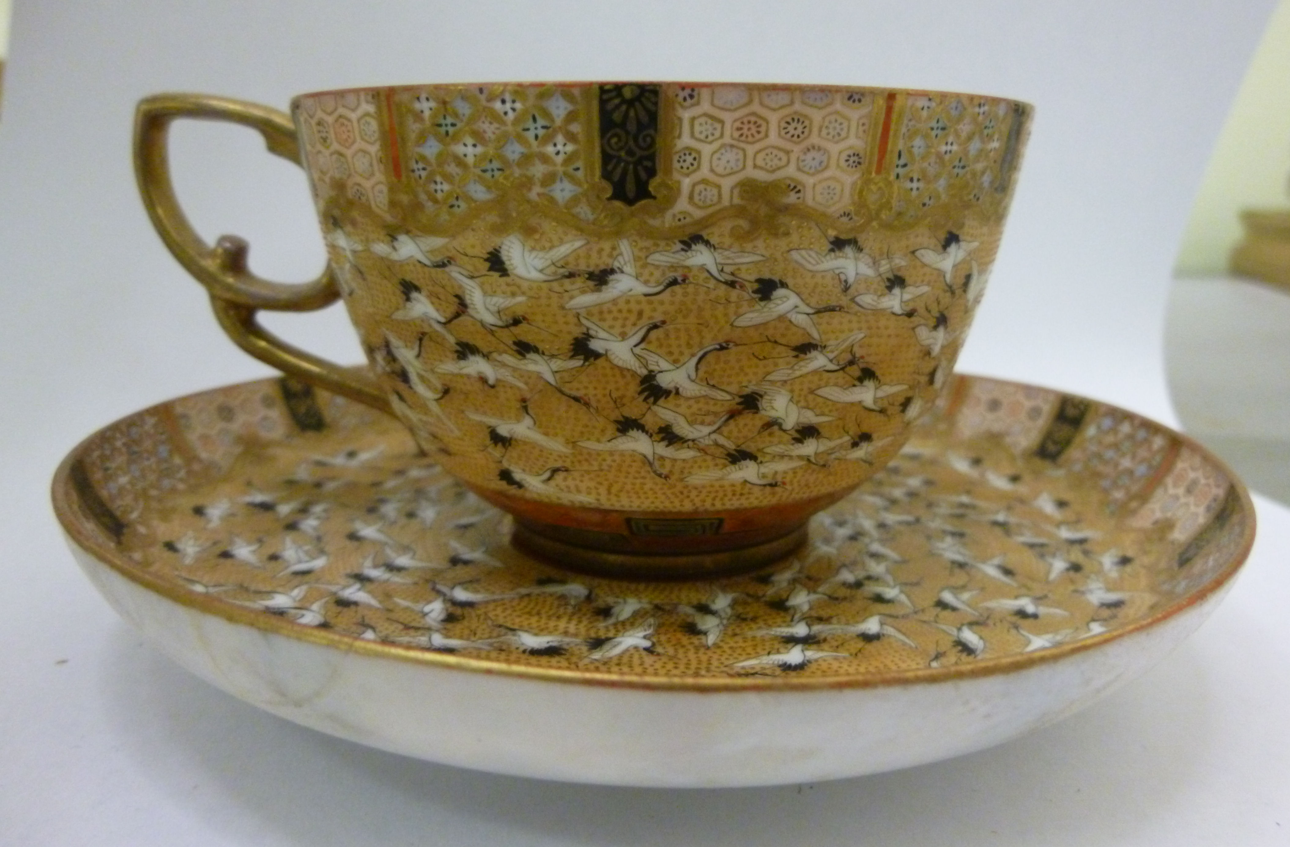 An early 20thC Kutani porcelain tea cup