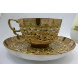 An early 20thC Kutani porcelain tea cup