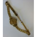 A lady's Omega 9ct gold round cased wris