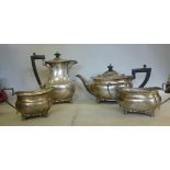 A four piece silver tea set of oval, oge