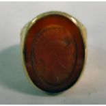 A 9ct gold signet ring, having cast foli