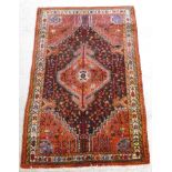 A North West Persian rug, the central di