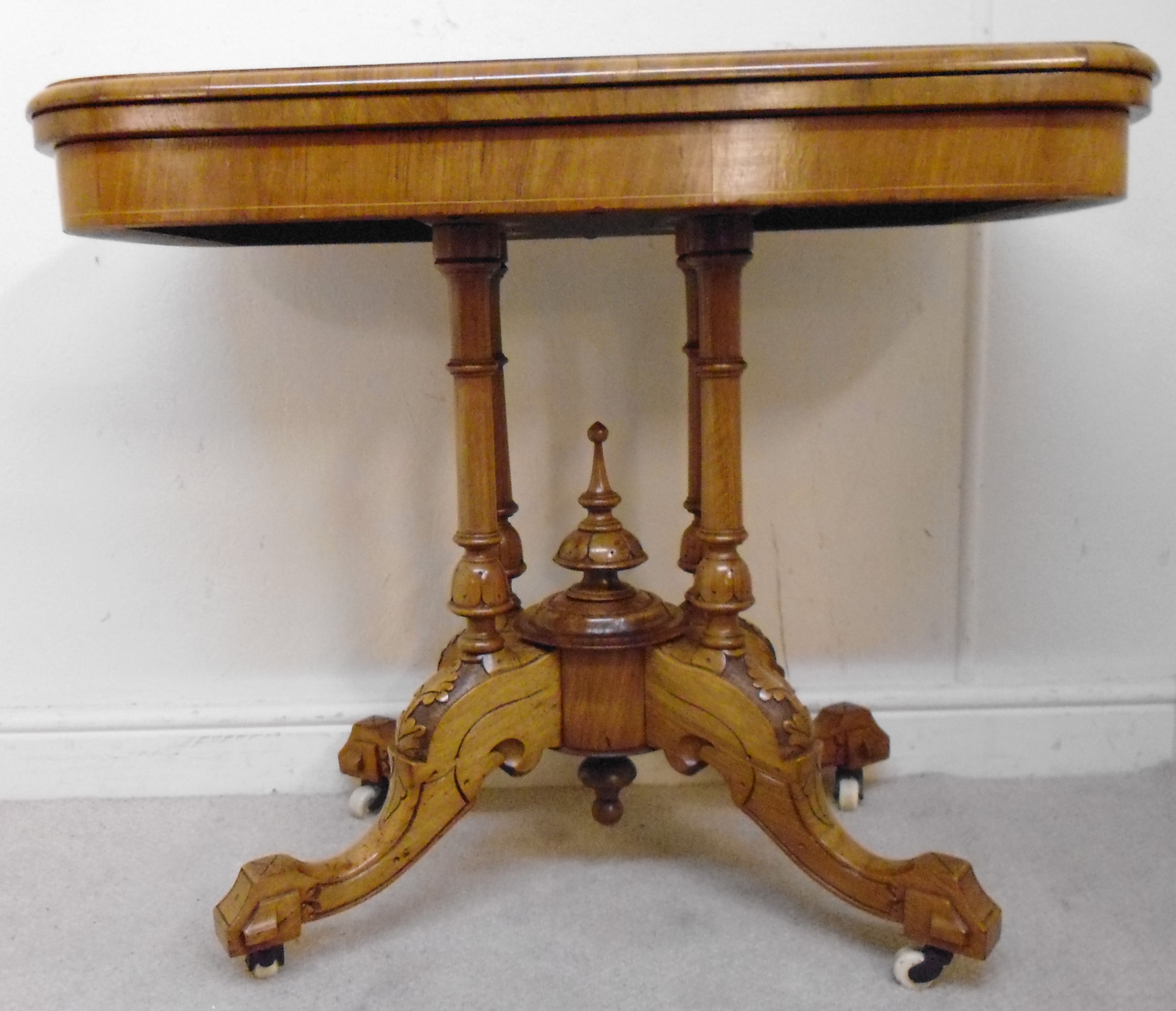 A late Victorian burr walnut and marquet