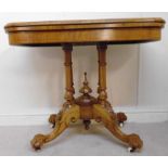 A late Victorian burr walnut and marquet