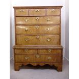 A mid 18thC walnut and oak chest on stan