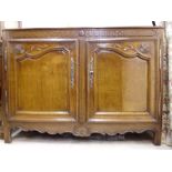 A mid 18thC French oak cabinet, having a