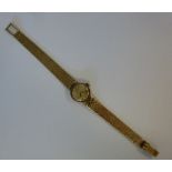 A lady's Omega 9ct gold round cased wris