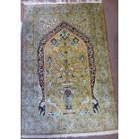 A Persian silk rug, the Tree of Life wit