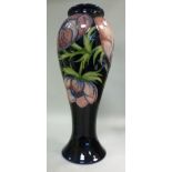 A Moorcroft pottery vase of waisted, sle