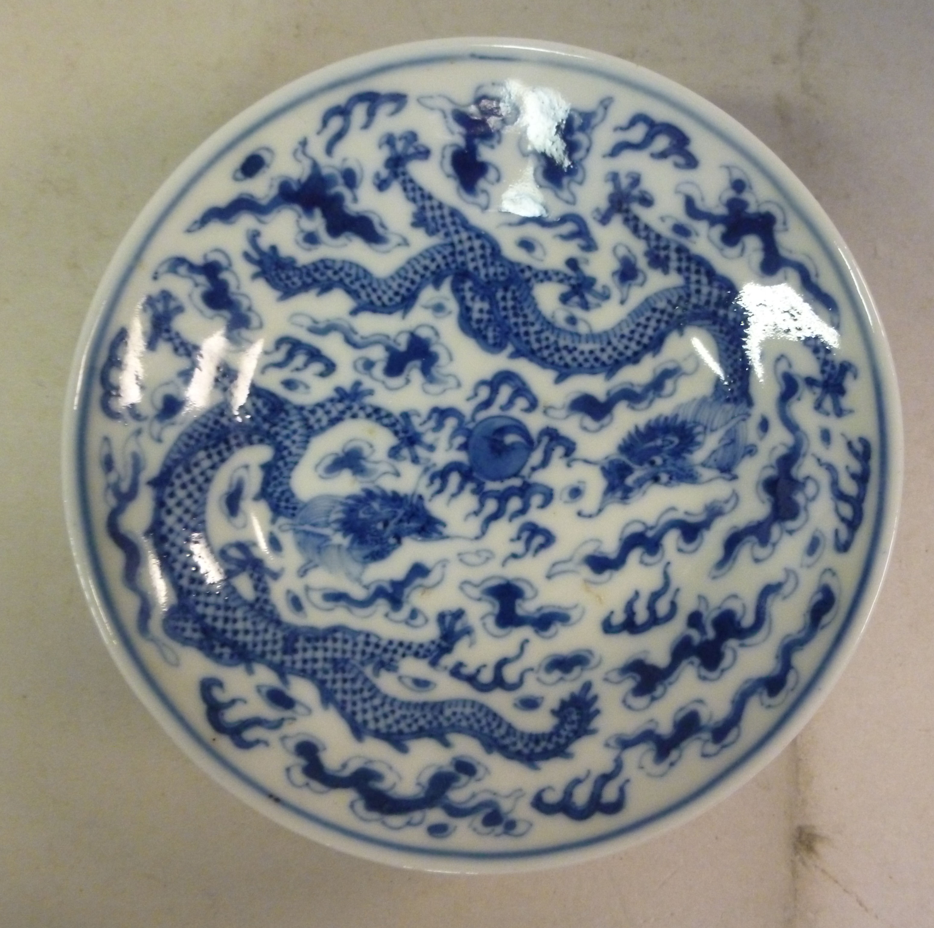 A late 19thC Chinese porcelain saucer di