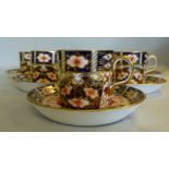 A set of six Royal Crown Derby china cof