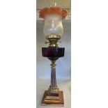 A late Victorian oil lamp, having twin b