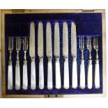 An Edwardian set of six engraved silver