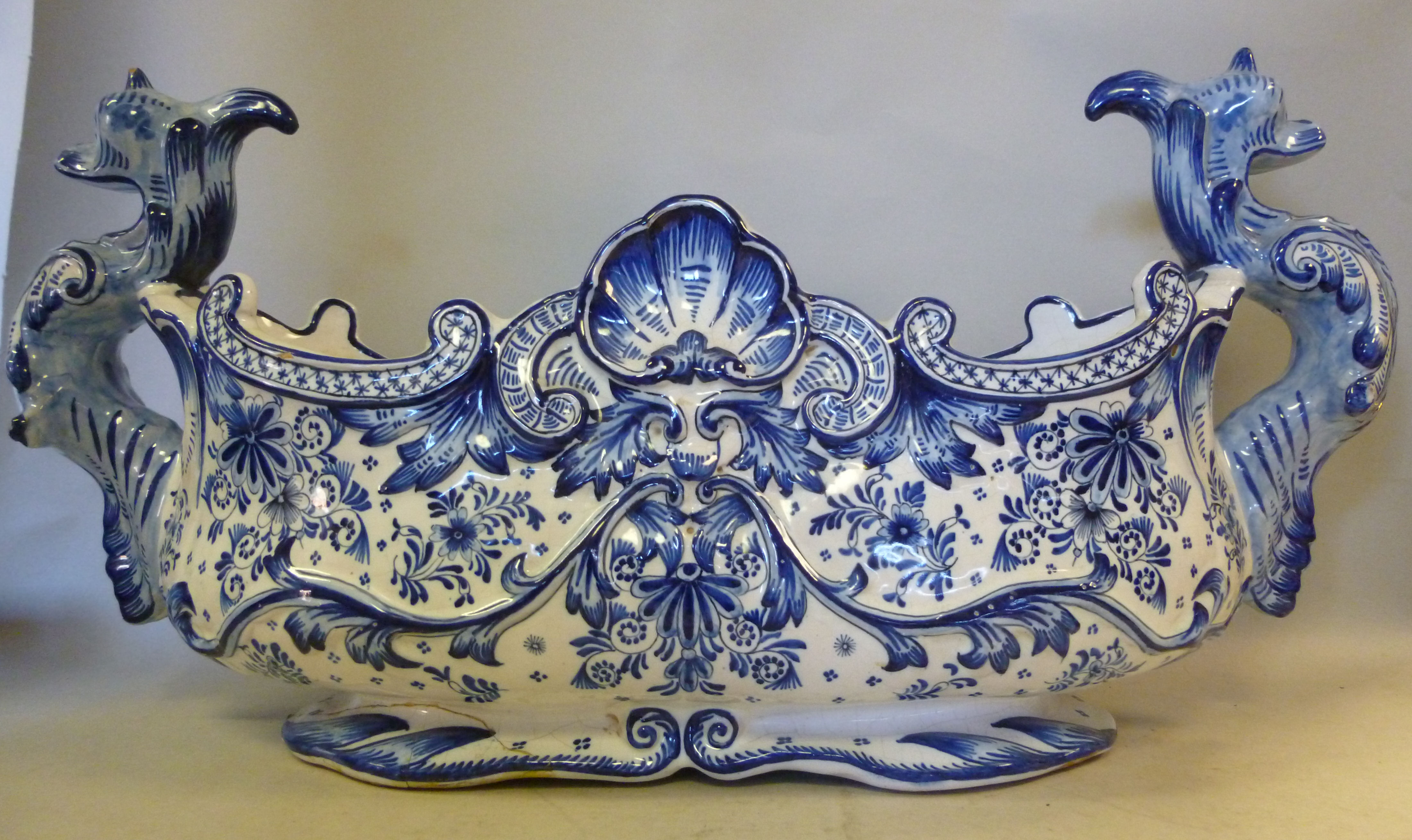 An early 20thC Dutch Delft vase of longb