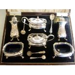 A six piece silver condiments set of oge