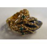 A gold coloured metal dress ring, cast w