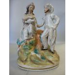 A mid 19thC Staffordshire pottery group,