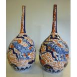 A pair of early 20thC Japanese Imari por