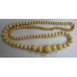 An early 20thC North African ivory neckl