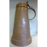 An Arts & Crafts copper ewer of tapered