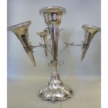 A silver epergne, comprising a central t