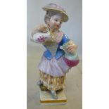 A late 19thC Meissen porcelain figure, a