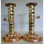 A pair of Arts & Crafts copper and brass