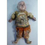 An early 20thC Chinese doll, a boy, havi