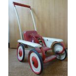 A vintage cream coloured and red painted