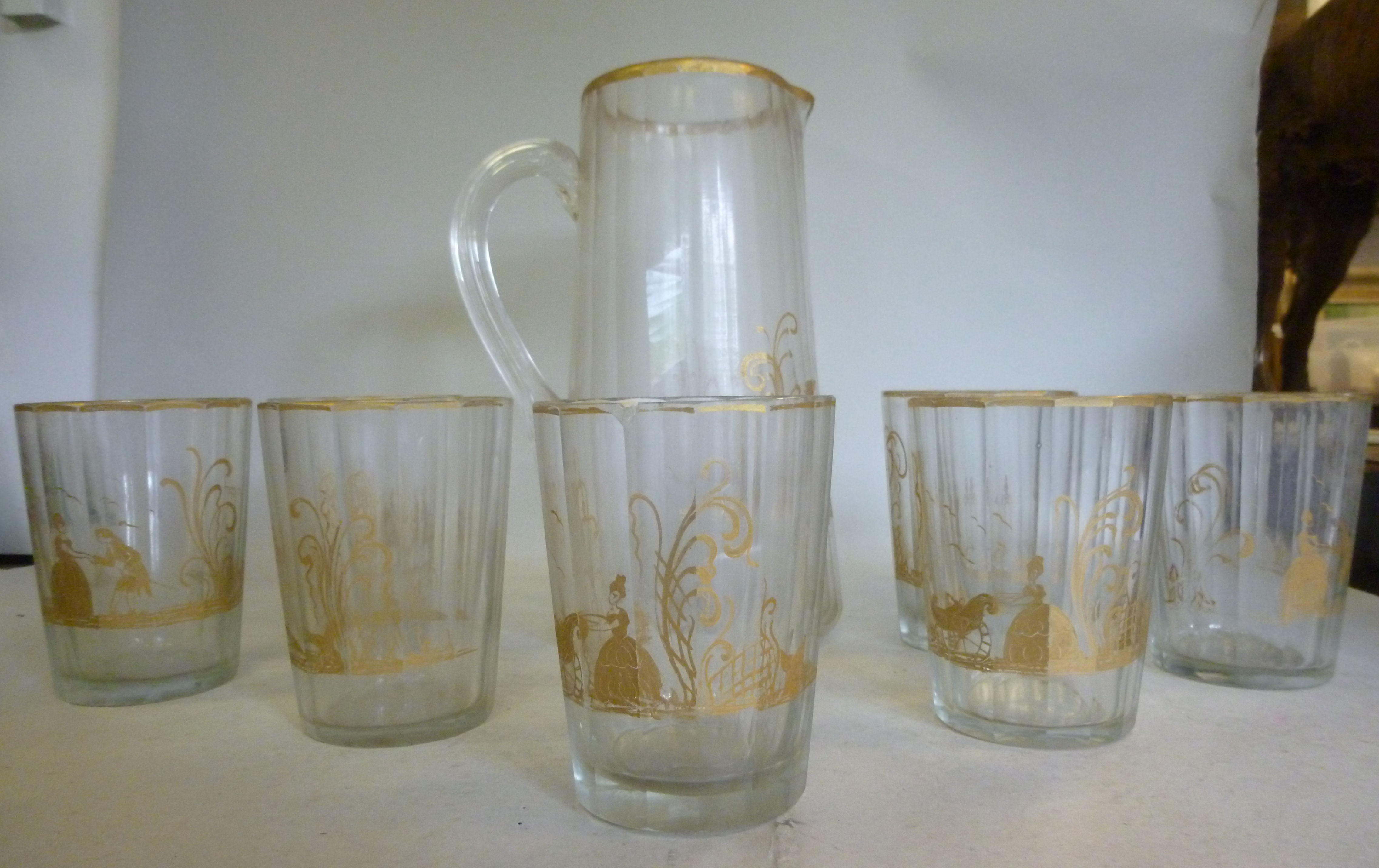 A mid 19thC facet cut glass cordial set,