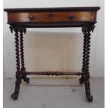 An early Victorian rosewood writing tabl