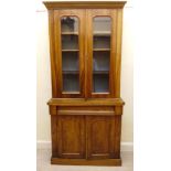 A late Victorian walnut cabinet bookcase