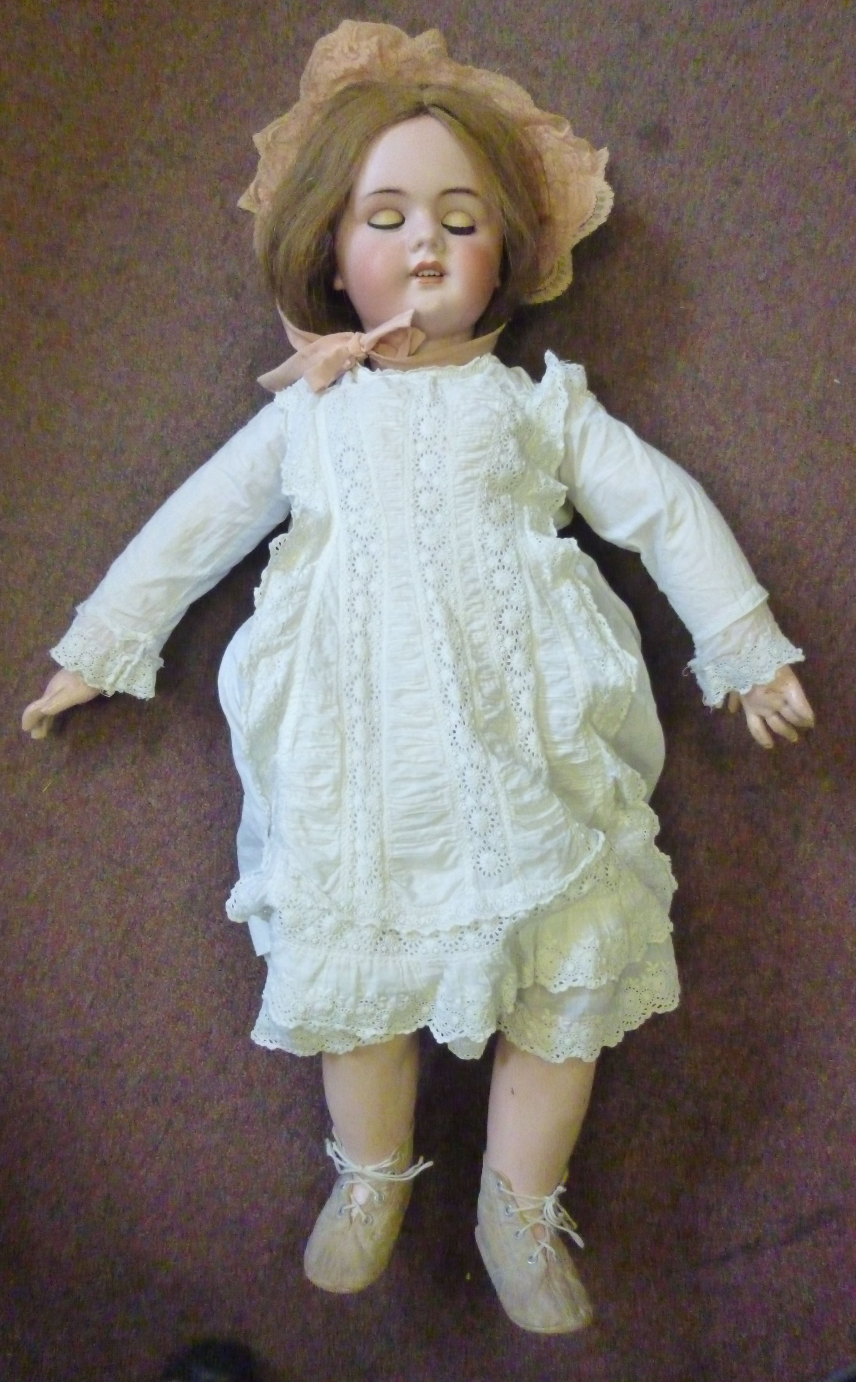A Tete Jumeau bisque head doll, having p