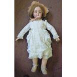 A Tete Jumeau bisque head doll, having p