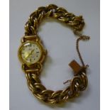 A lady's Mielo 18ct gold round cased wri