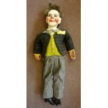 A mid 20thC ventriloquist's dummy, havin